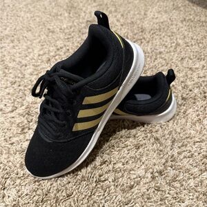 Adidas Black Sneakers with Yellow Stripes
